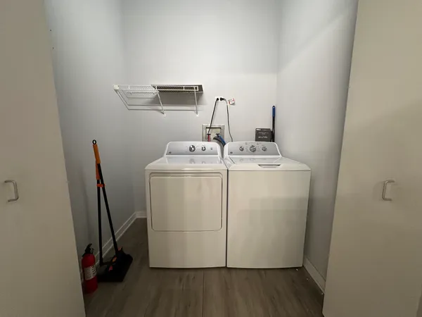 a utility room with dryer and washer