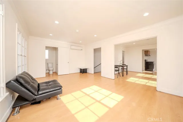 a living room with furniture and a table
