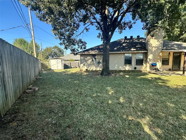 a house view with a garden space