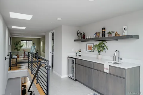 a kitchen with stainless steel appliances a sink and cabinets