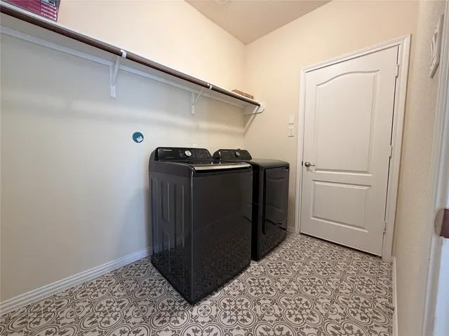 a view of a swimming pool with a yard