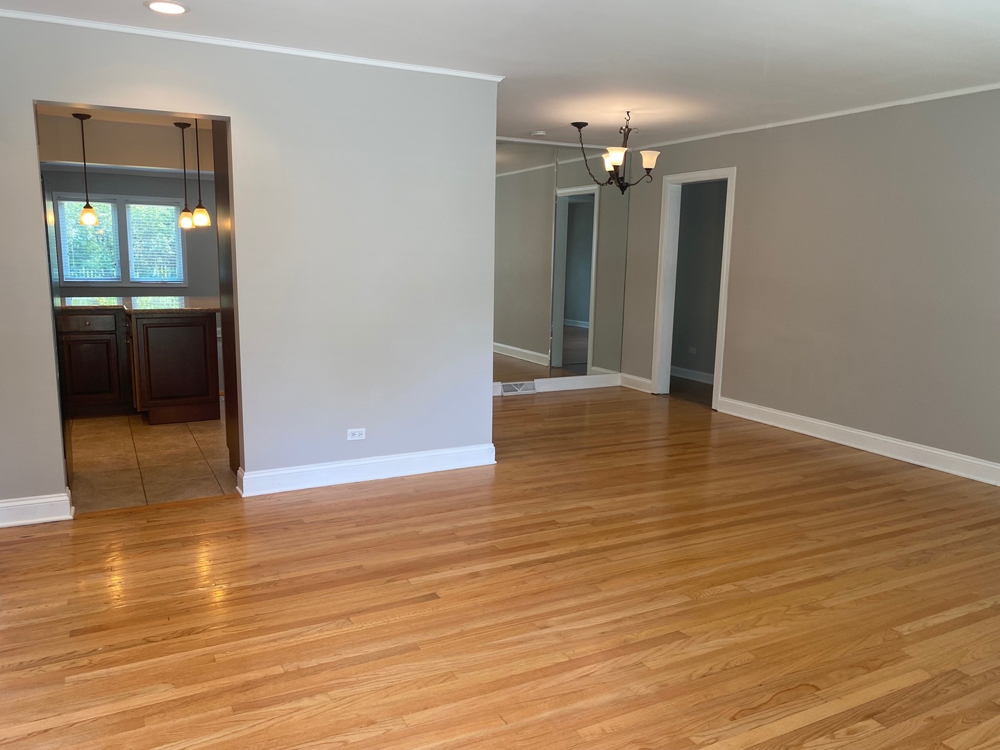 1009 Dell Road Northbrook, IL 60062 - Photo 2 of 15 a view of a livingroom with a chandelier
