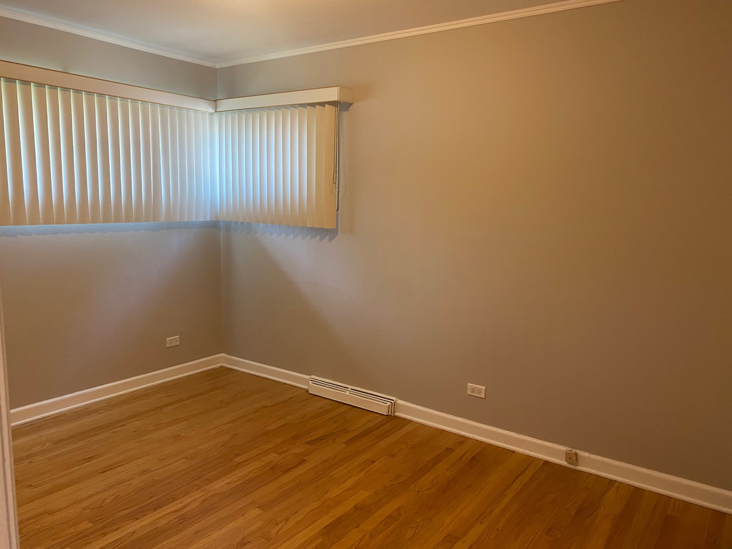 1009 Dell Road Northbrook, IL 60062 - Photo 10 of 15 a view of an empty room with wooden floor