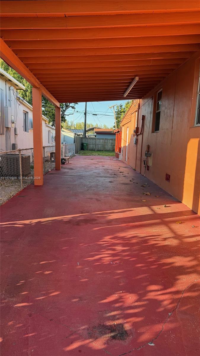 309 East 18th Street Hialeah, FL 33010 - Photo 12 of 15 a view of a patio with wooden floor