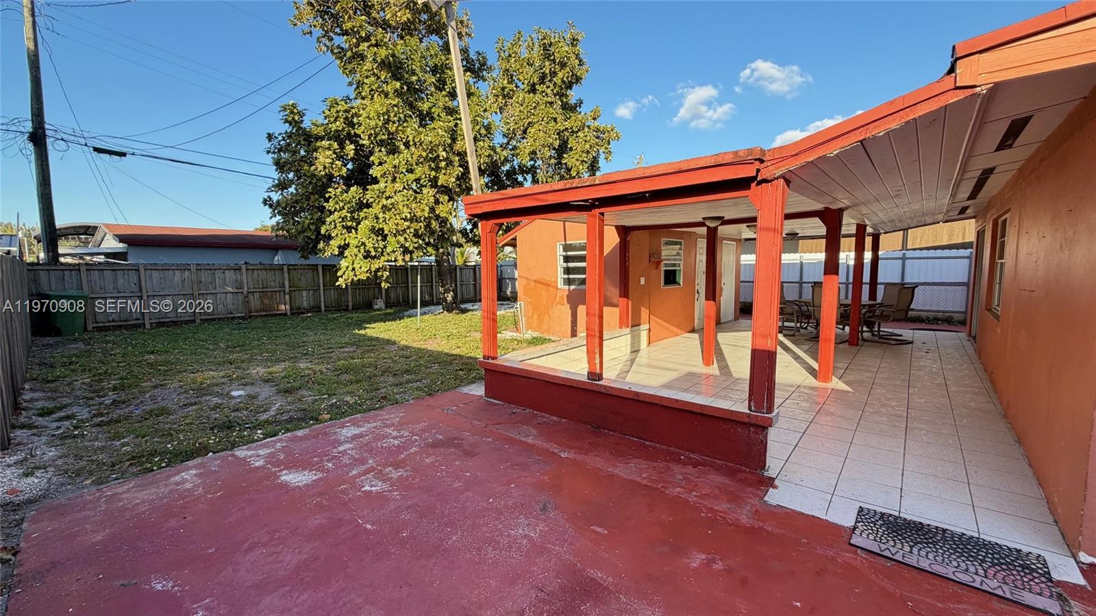 309 East 18th Street Hialeah, FL 33010 - Photo 13 of 15 a view of a backyard with sitting area
