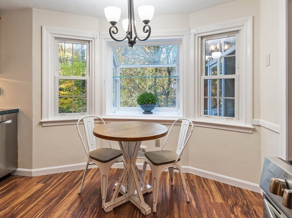 6 Holbrook Road Wayland, MA 01778 - Photo 8 of 23 a view of a dining room with furniture window and wooden floor