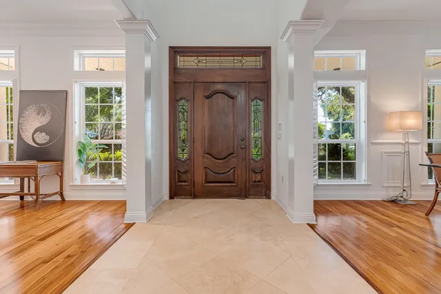 a kitchen with stainless steel appliances a refrigerator sink and microwave
