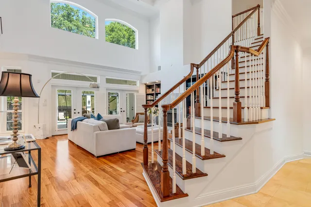 a kitchen with stainless steel appliances a refrigerator sink and cabinets