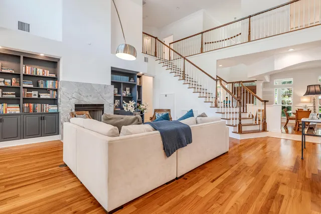 a kitchen with granite countertop a sink stainless steel appliances and cabinets