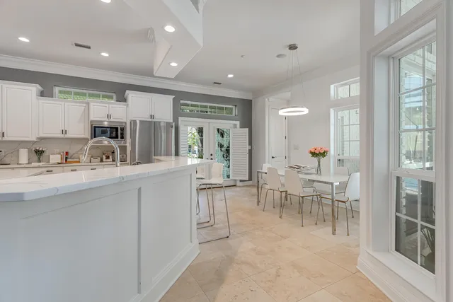 a view of room with hardwood wall and a window