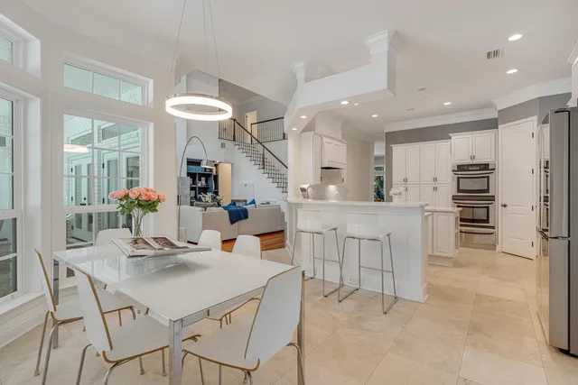 a spacious bedroom with a bed and a window