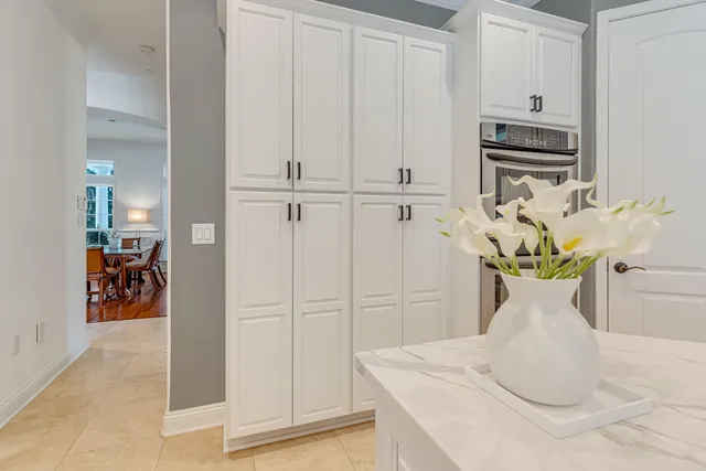 a spacious bedroom with a bed and a window
