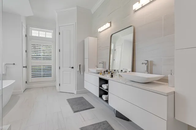 a view of a swimming pool with outdoor seating