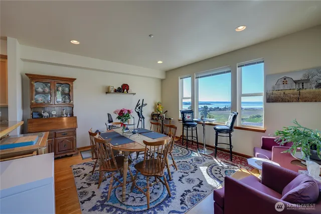 a view of a dining room with furniture window and outside view