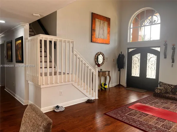 a dinning table and chairs in the kitchen