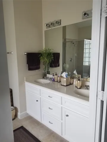a bathroom with a tub and a sink