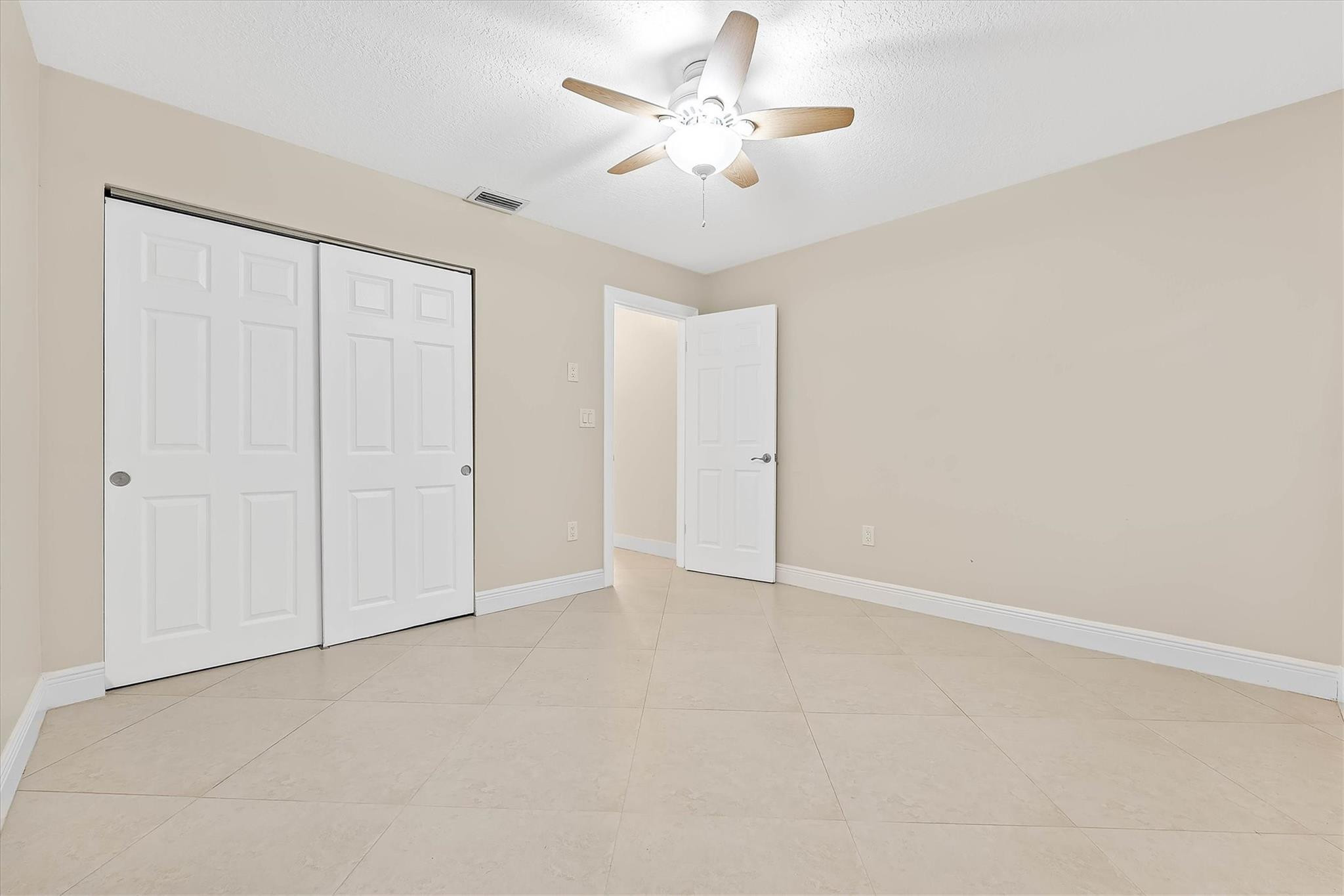 11288 Southwest 59th Court Cooper City, FL 33330 - Photo 14 of 32 a view of an empty room