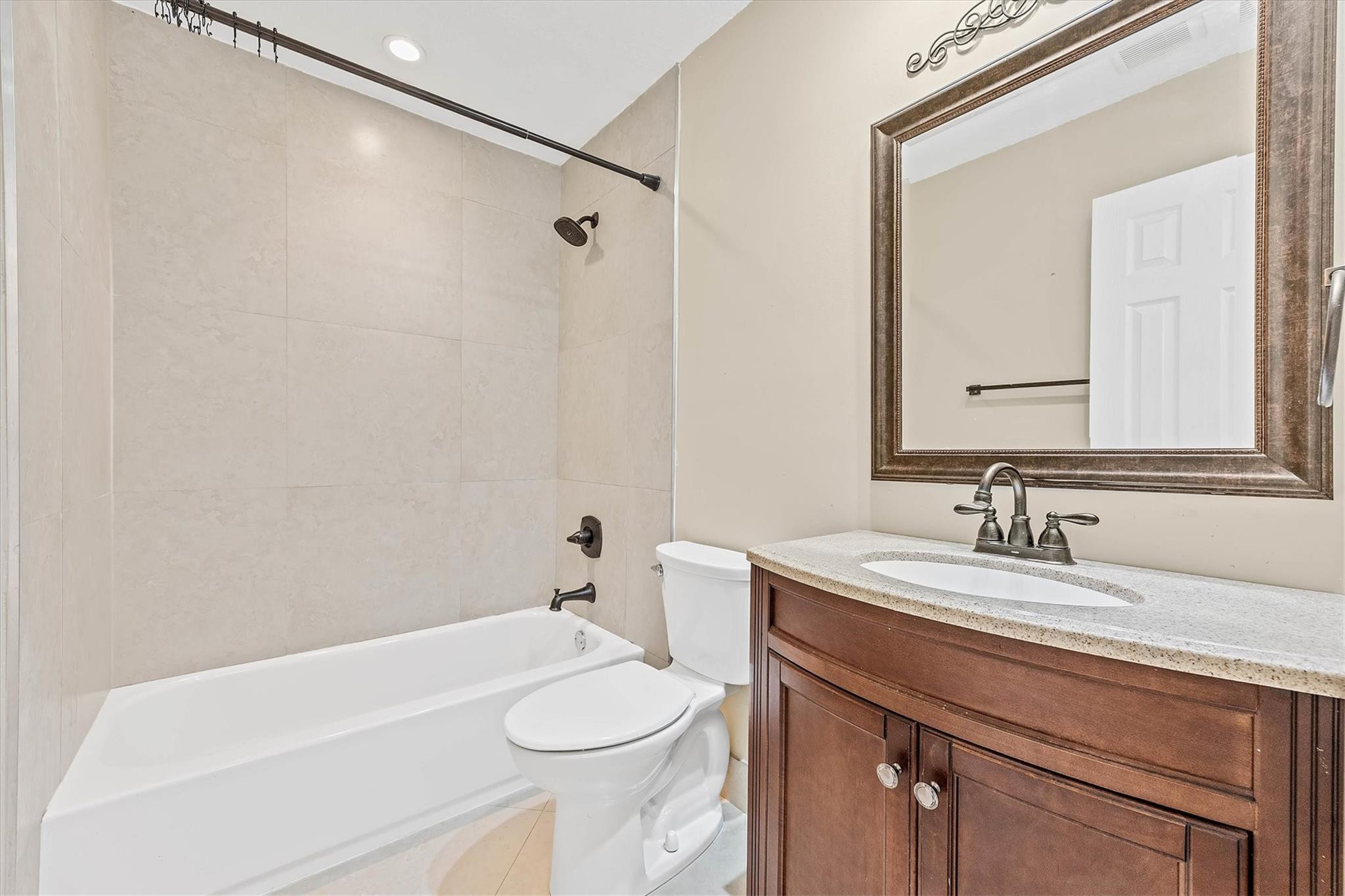 11288 Southwest 59th Court Cooper City, FL 33330 - Photo 15 of 32 a bathroom with a sink a toilet and a mirror