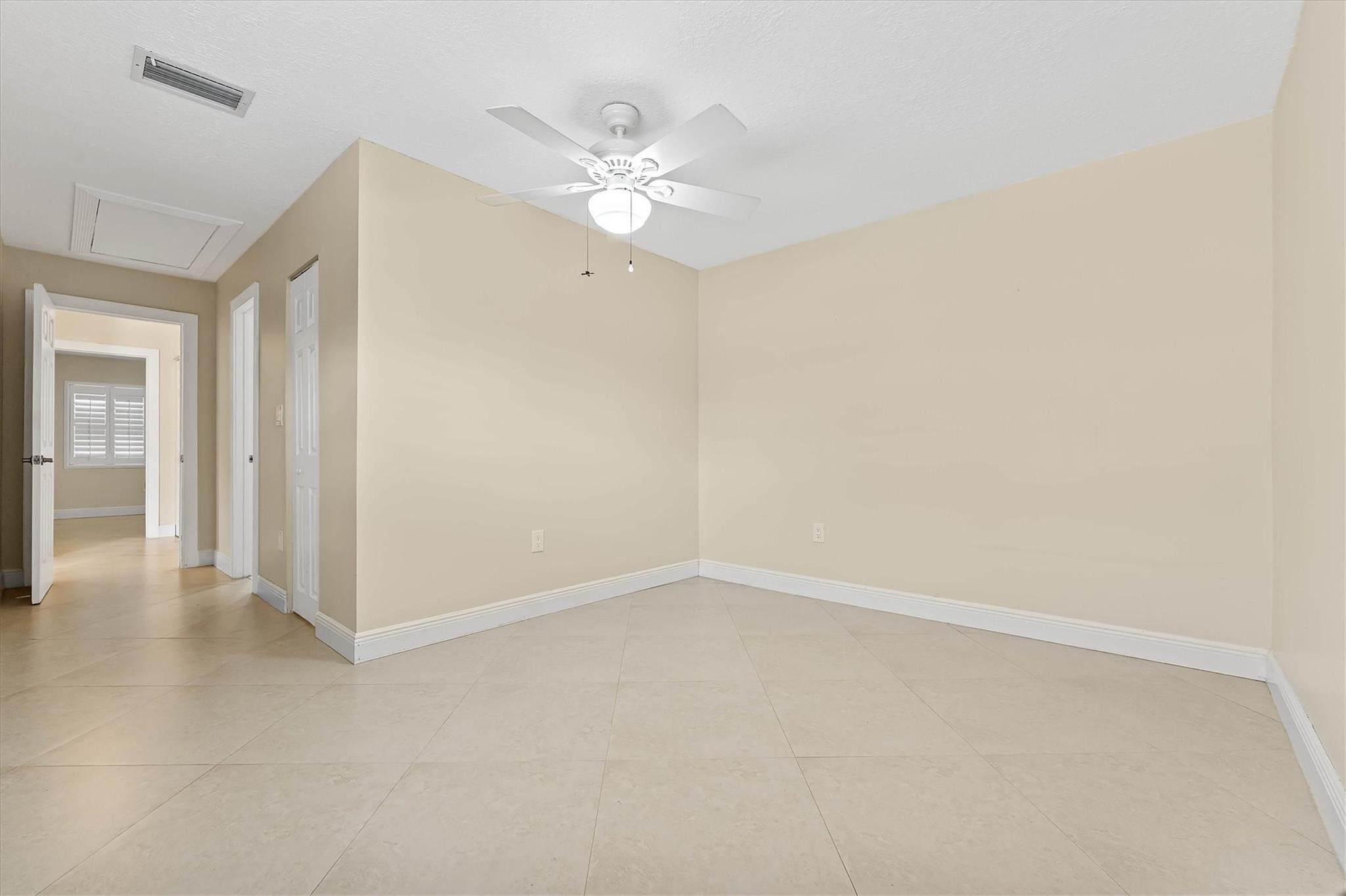 11288 Southwest 59th Court Cooper City, FL 33330 - Photo 18 of 32 wooden floor in an empty room