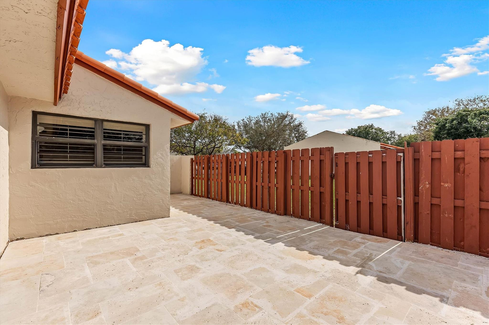 11288 Southwest 59th Court Cooper City, FL 33330 - Photo 23 of 32 a view of a backyard with wooden fence
