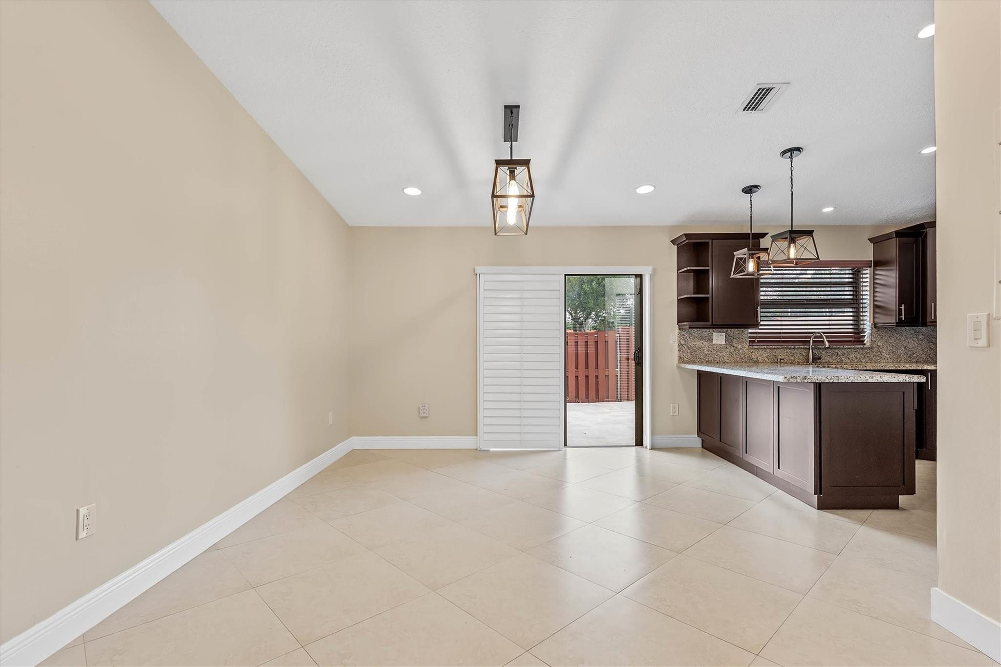 11288 Southwest 59th Court Cooper City, FL 33330 - Photo 5 of 32 a kitchen with stainless steel appliances a refrigerator and a stove top oven