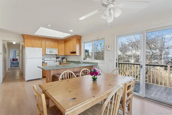 a view of kitchen with furniture and window