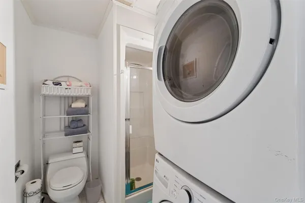 a bathroom with a toilet and a sink