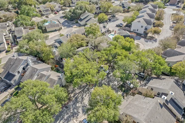 an aerial view of residential house with parking space