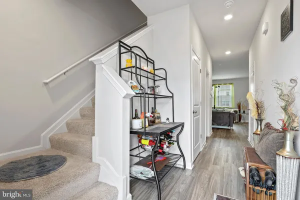 a view of entryway livingroom and hall