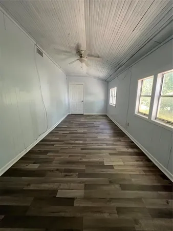 a view of an empty room and window