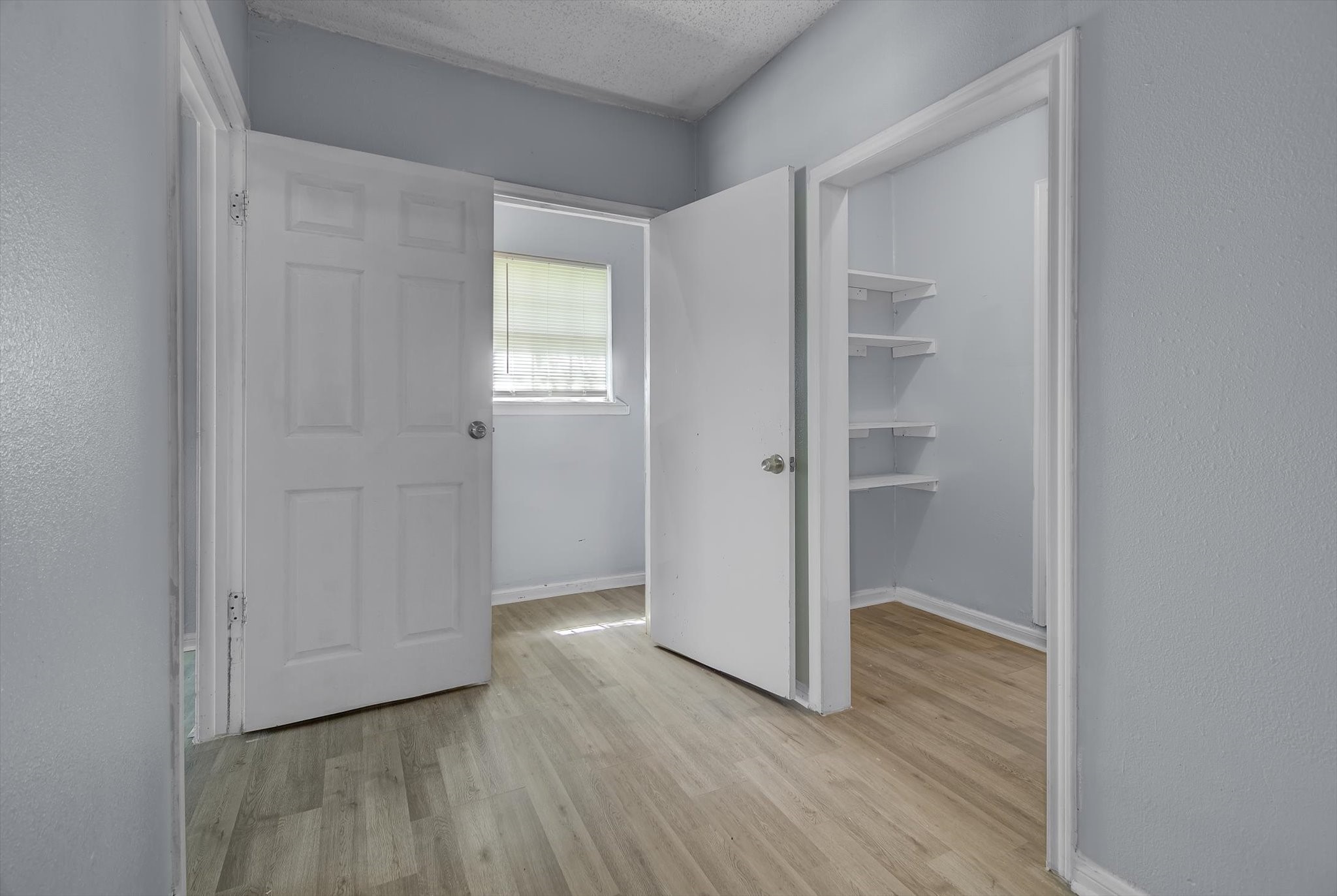 418 Azalea Street Lake Jackson, TX 77566 - Photo 13 of 34 wooden floor in an empty room