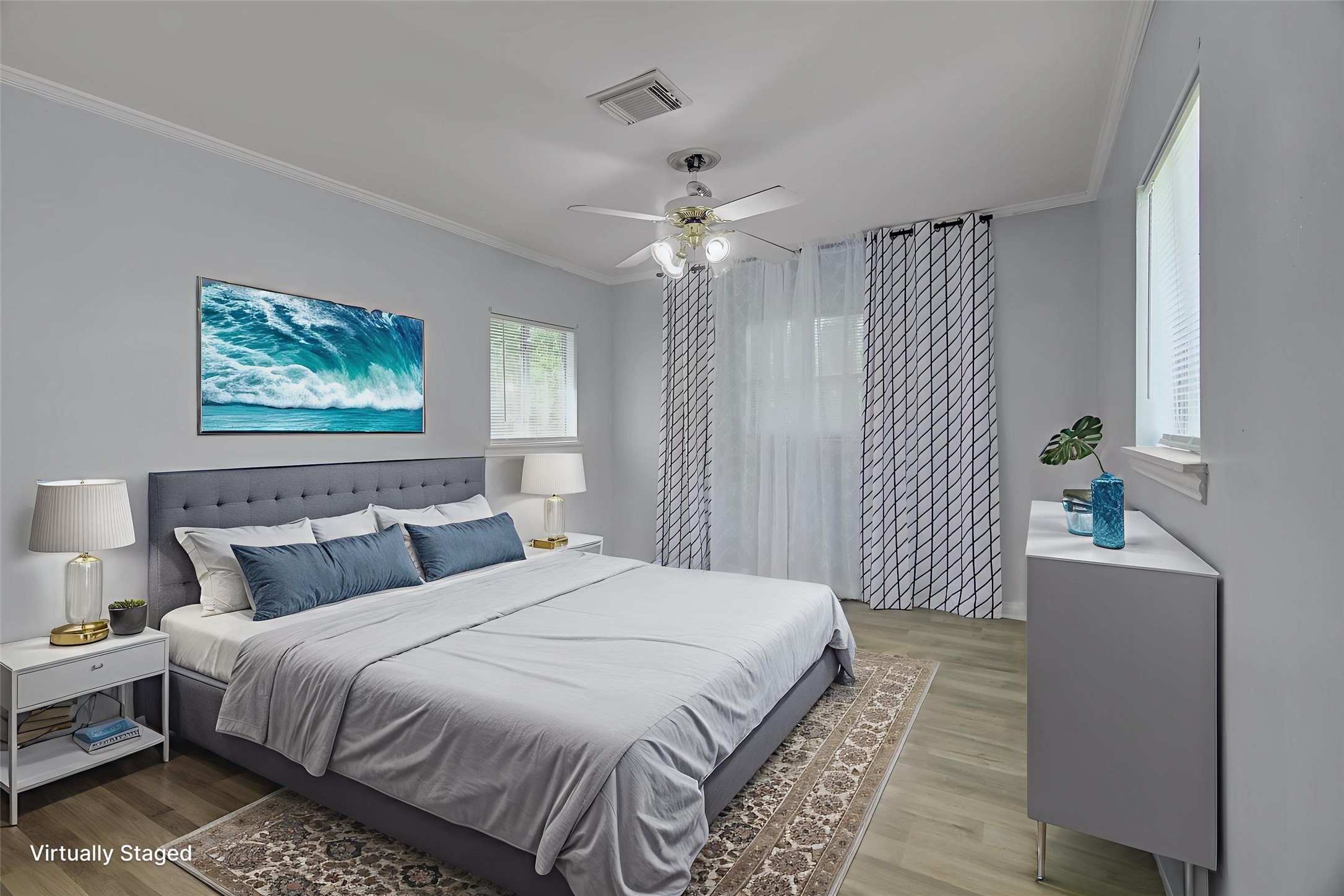 418 Azalea Street Lake Jackson, TX 77566 - Photo 4 of 34 This elegantly virtually staged primary bedroom offers a serene retreat with modern decor and ample natural light.