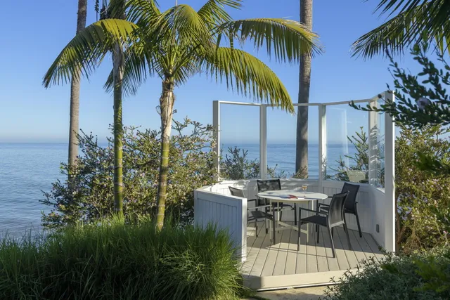 a view of a backyard with a patio