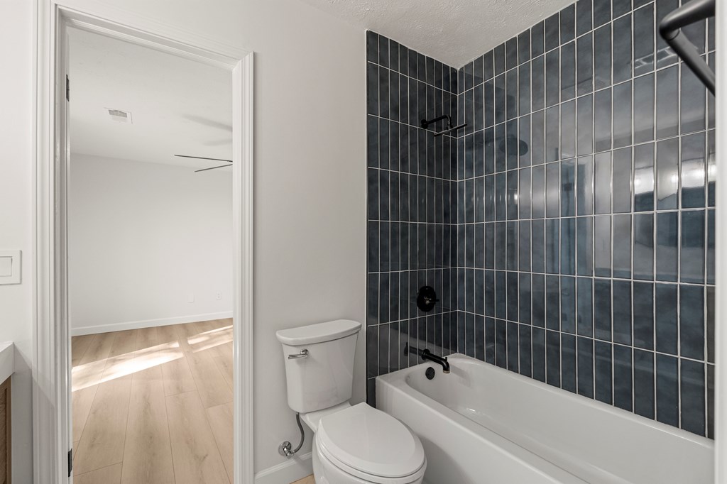 6758 Standing Boy Road Columbus, GA 31904 - Photo 27 of 46 a bathroom with a toilet and shower