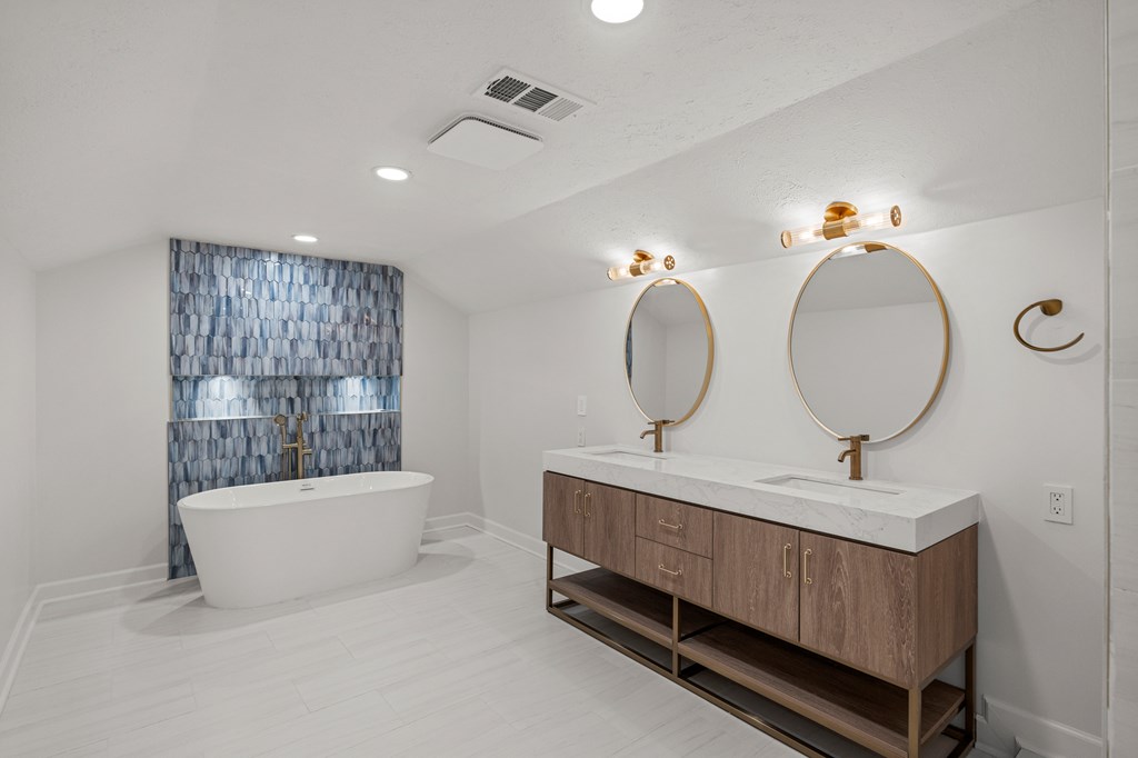 6758 Standing Boy Road Columbus, GA 31904 - Photo 34 of 46 a bathroom with a sink a toilet and a mirror