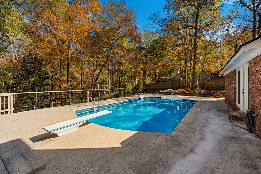 6758 Standing Boy Road Columbus, GA 31904 - Photo 39 of 46 a view of a backyard with swimming pool