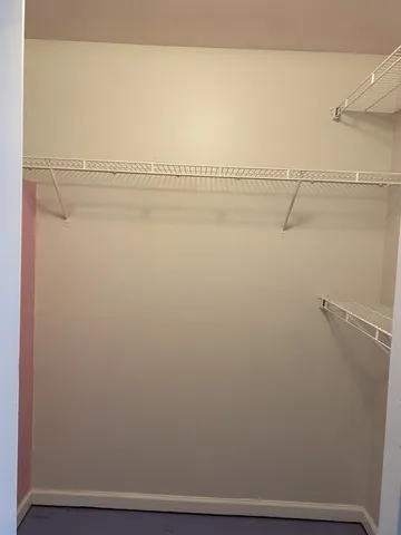 a view of small space with racks on the wall