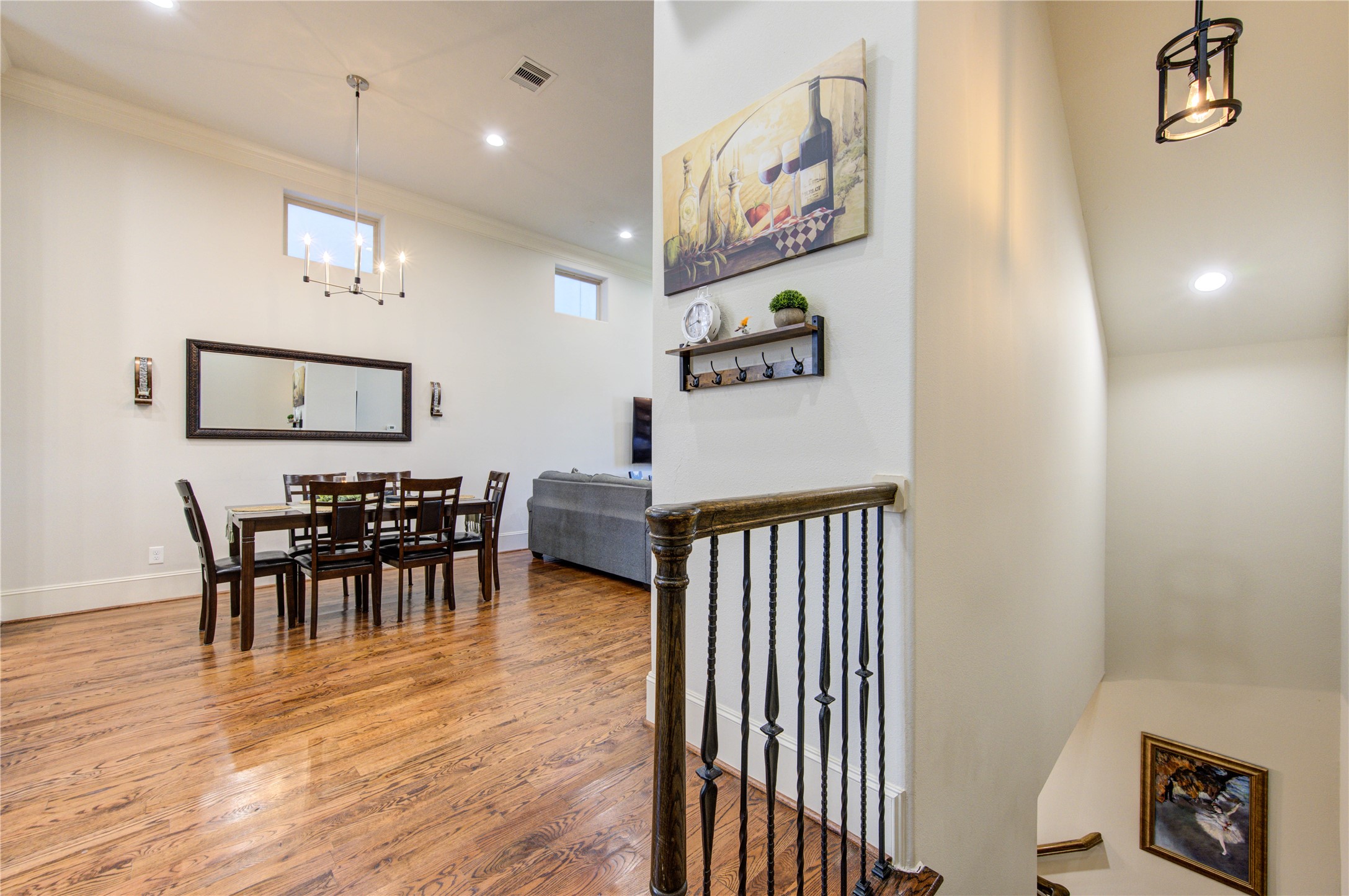 411 West 17th Street, Unit B Houston, TX 77008 - Photo 15 of 50 a view of a dining room with furniture and wooden floor