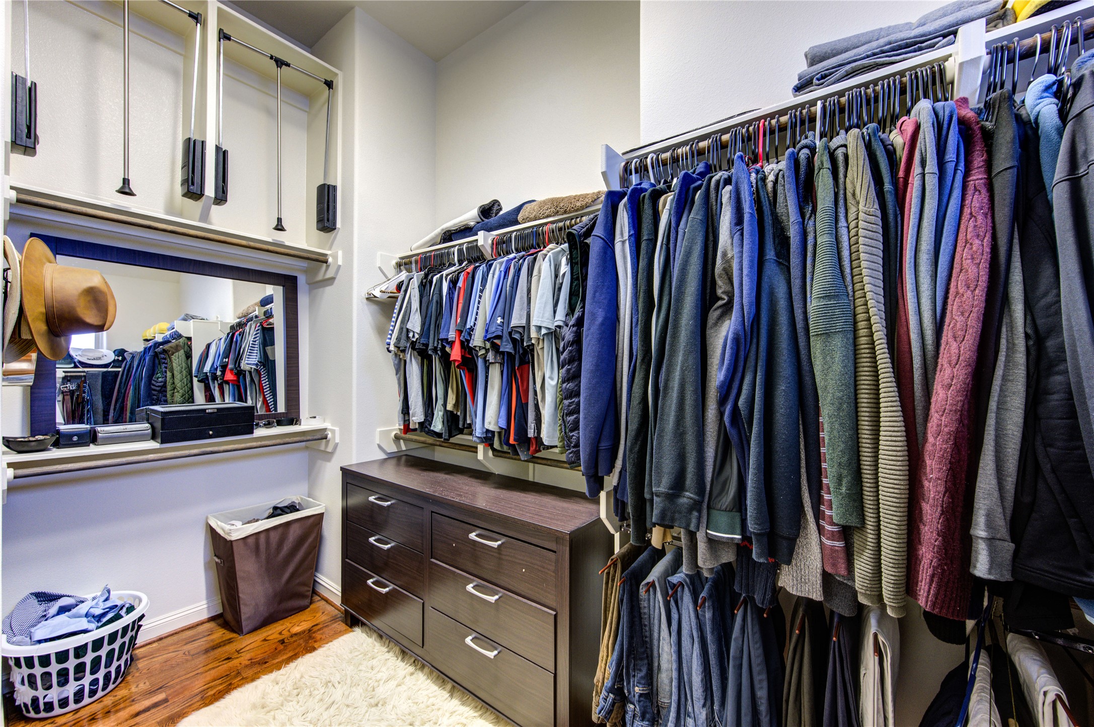 411 West 17th Street, Unit B Houston, TX 77008 - Photo 31 of 50 a view of walk in closet with clothes and shoes