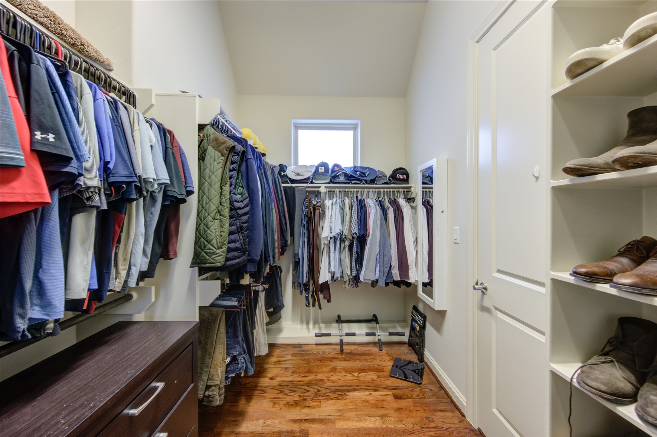411 West 17th Street, Unit B Houston, TX 77008 - Photo 32 of 50 a view of walk in closet with clothes and shoes