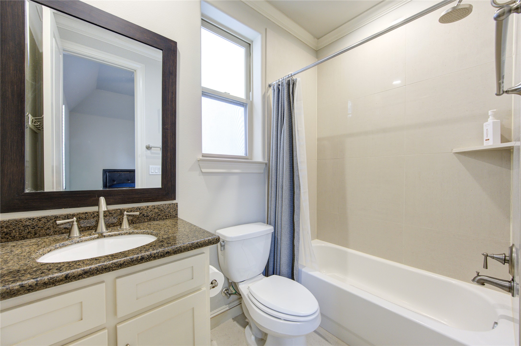 411 West 17th Street, Unit B Houston, TX 77008 - Photo 35 of 50 a bathroom with a granite countertop sink toilet and shower