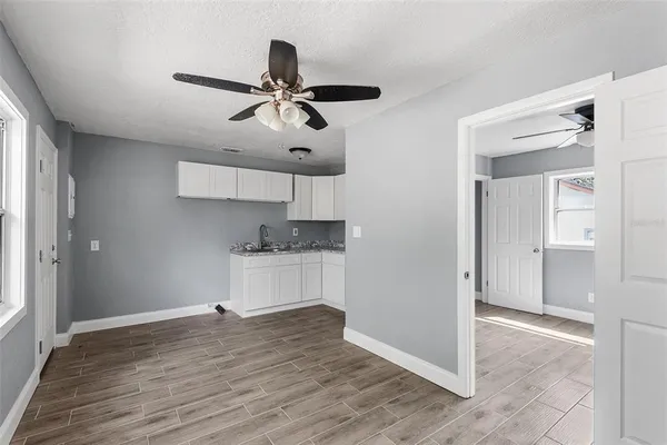 a kitchen with stainless steel appliances kitchen island a stove and a refrigerator