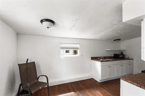 a kitchen with a appliances and cabinets