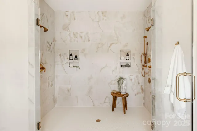 a bathroom with a sink mirror and