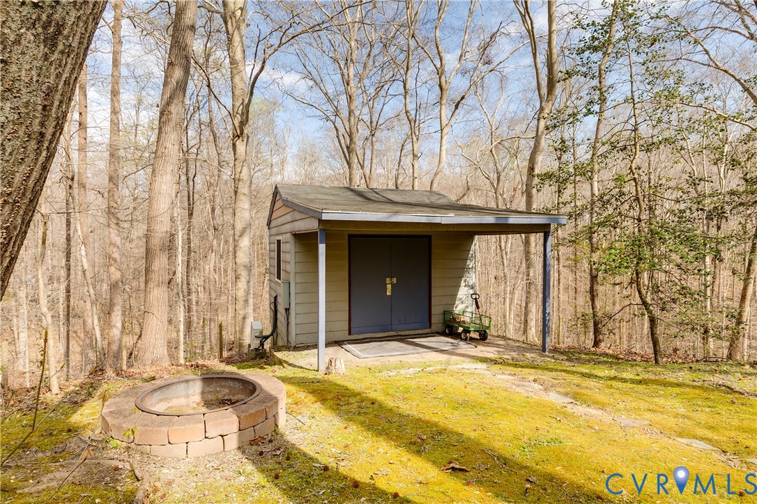 9536 Williamsville Road Mechanicsville, VA 23116 - Photo 28 of 32 Climate-controlled outbuilding ideal for home offi