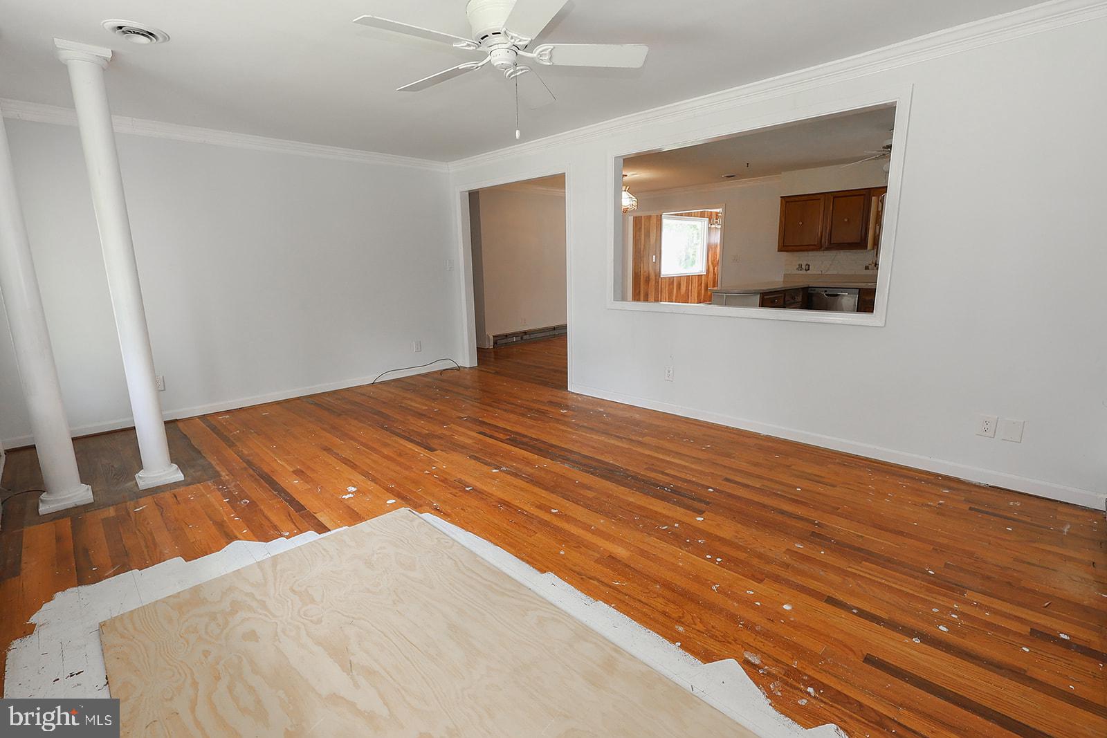 48146 Mallard View Lane St. Inigoes, MD 20684 - Photo 8 of 46 Spacious room with polished floors.