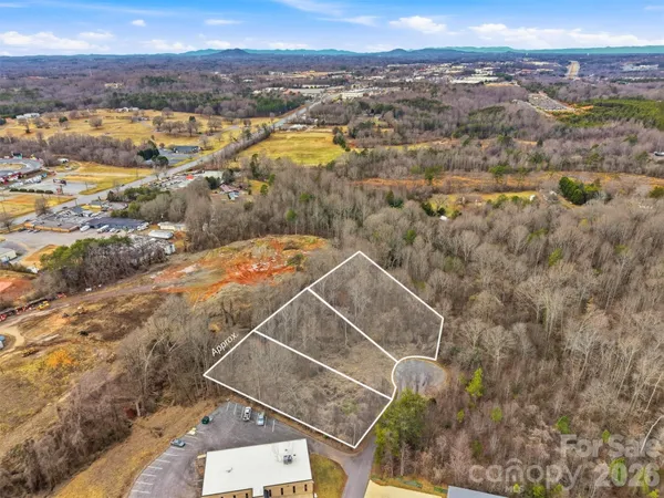 an aerial view of residential house with outdoor space