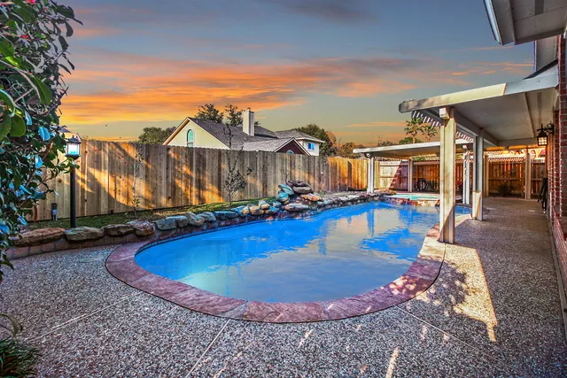 a view of a house with swimming pool