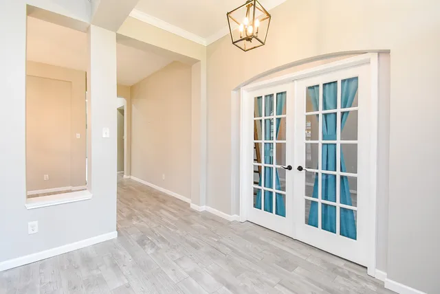 an empty room with windows