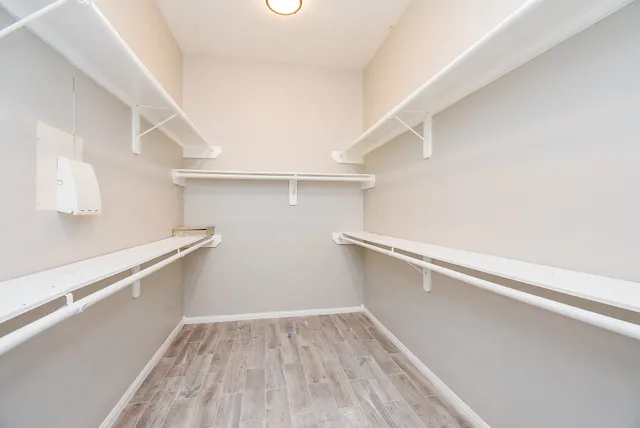 a view of an empty walk in closet